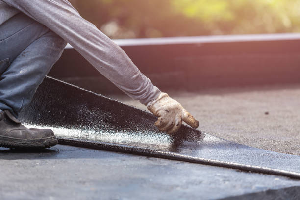 Professional Emergency Waterproofing technician working in Germantown, WI
